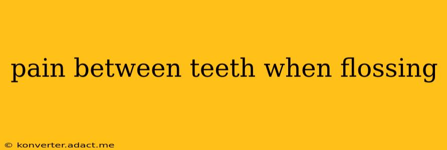 pain between teeth when flossing